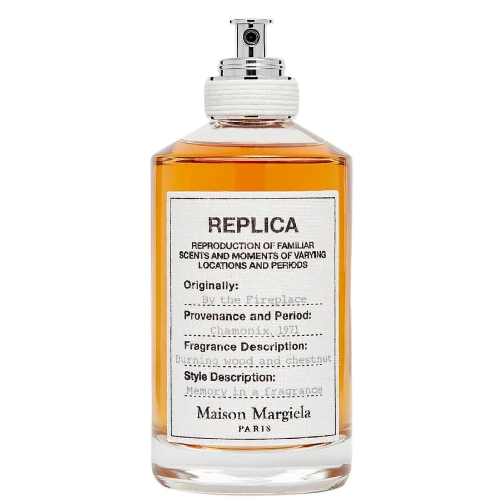 Bottle of Maison Margiela Replica fragrance with a white label.