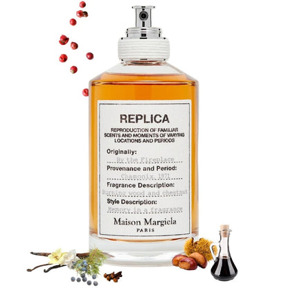 A bottle of Maison Margiela Replica perfume surrounded by scattered rose petals and spices.